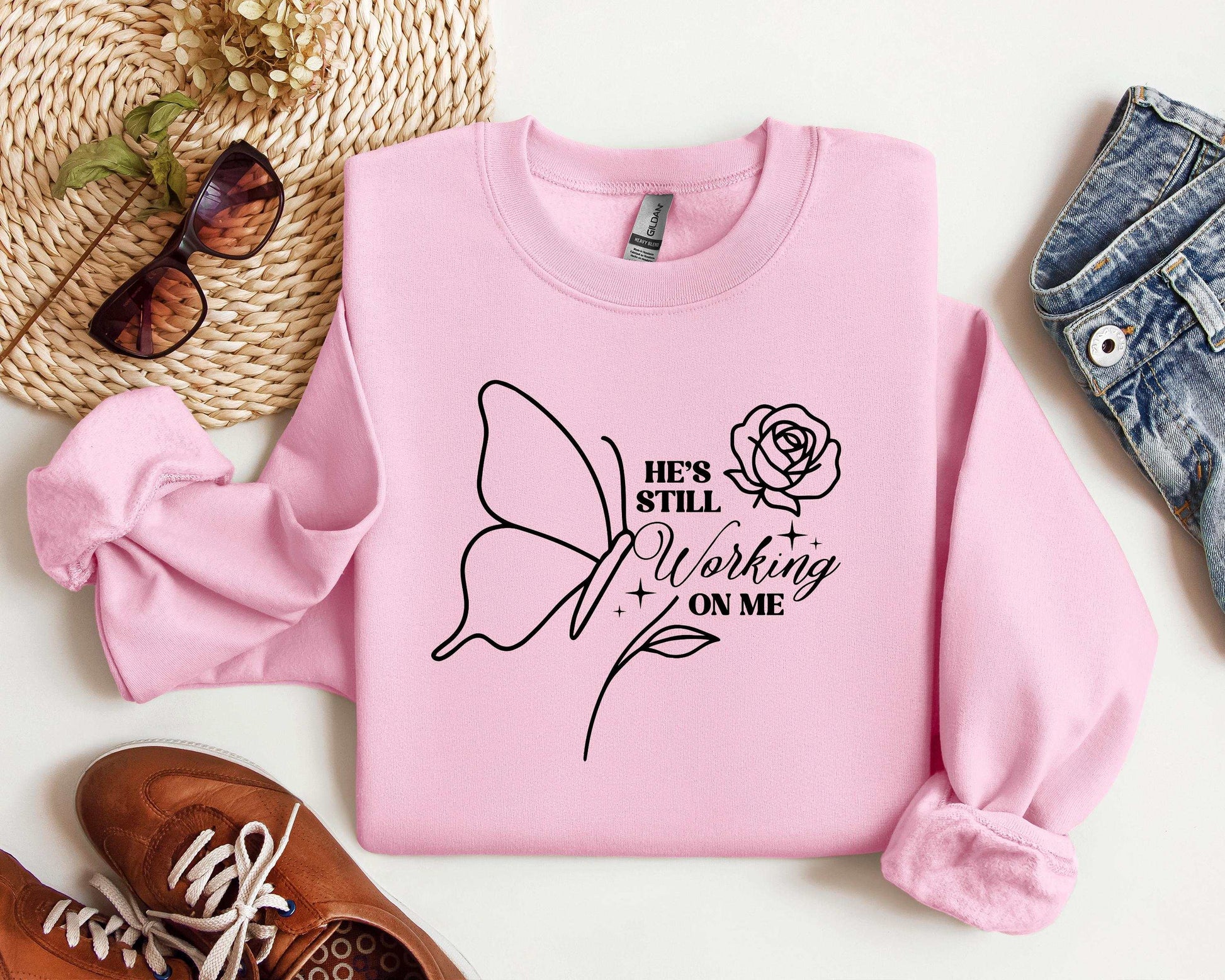 Christian Fleece Sweatshirt • He Is Still Working On Me, Faith Apparel