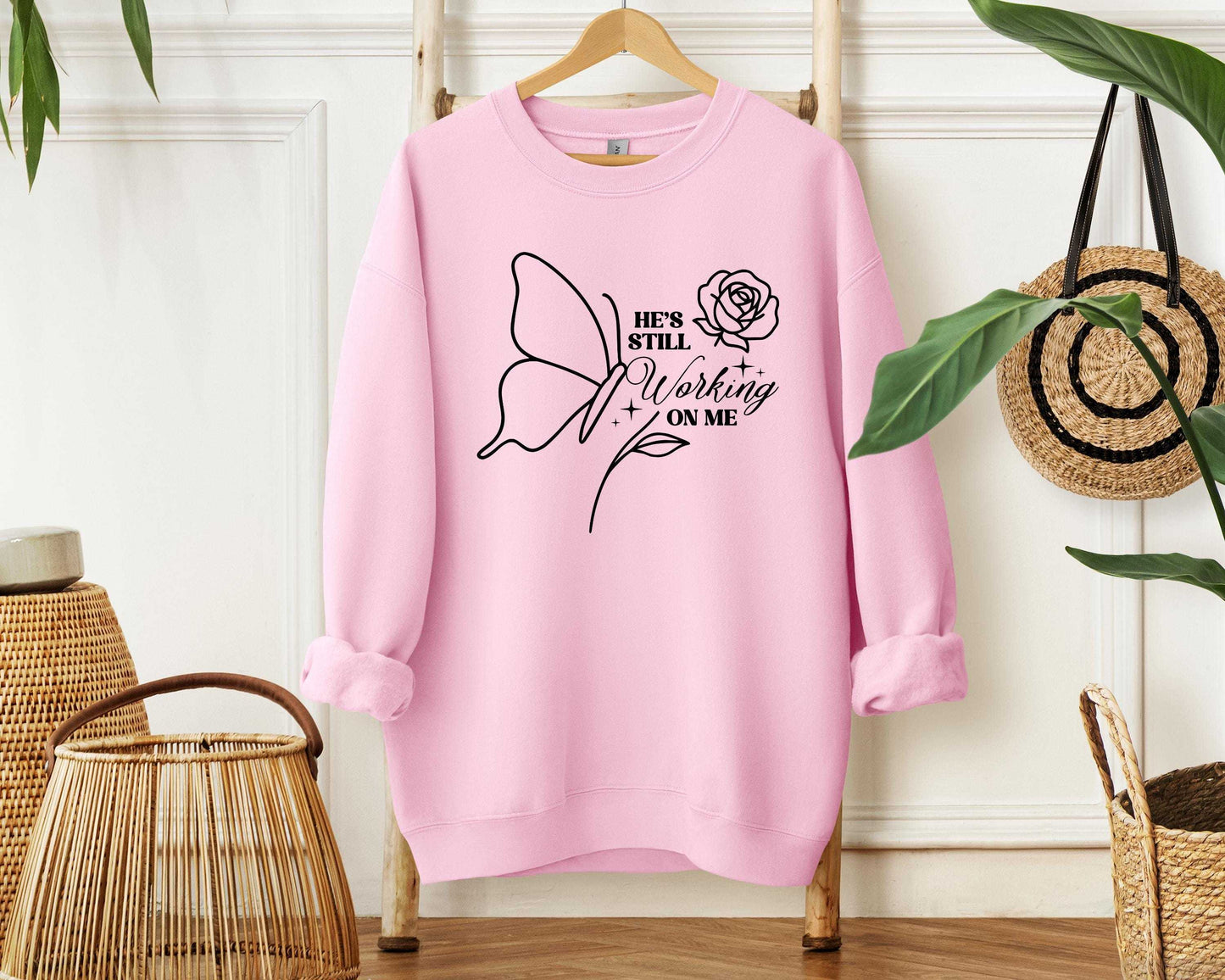 Christian Fleece Sweatshirt • He Is Still Working On Me, Faith Apparel
